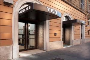 a facade of a building with a sign that reads pivot at Yes Hotel Boutique Rome in Rome