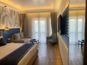TV a/nebo společenská místnost v ubytování Le Seasons Resort
