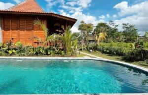 Kolam renang di atau dekat dengan Jagadhita Villas Ubud Bali