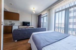 Postel nebo postele na pokoji v ubytování ELİT SUİT