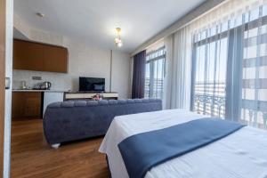 Postel nebo postele na pokoji v ubytování ELİT SUİT