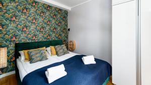Posteľ alebo postele v izbe v ubytovaní Wonder Home - Apartamenty w zielonej okolicy, blisko centrum Karpacza