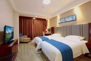 Voodi või voodid majutusasutuse Bestway Hotel Xi'an toas