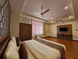 Μια τηλεόραση ή/και κέντρο ψυχαγωγίας στο Hotel The Parmatma