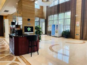 Televiisor ja/või meelelahutuskeskus majutusasutuses Bestway Hotel Xi'an