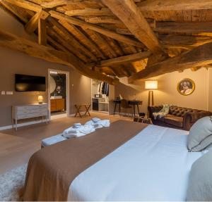 Posteľ alebo postele v izbe v ubytovaní Hotel Palacio De Luko