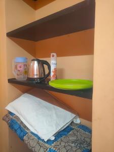 Kuchyň nebo kuchyňský kout v ubytování Pushpa Mahal A/C & Pushpa Residency