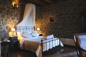 Postel nebo postele na pokoji v ubytování Nymfes Guesthouse