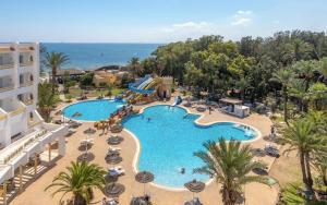 an overhead view of a pool at a resort at Marhaba Royal Salem - Family Only in Sousse