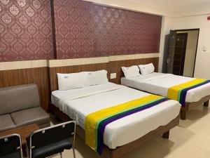 Letto o letti in una camera di Hotel BCP Suites
