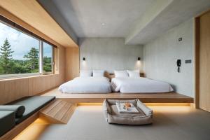 Letto o letti in una camera di Kinock