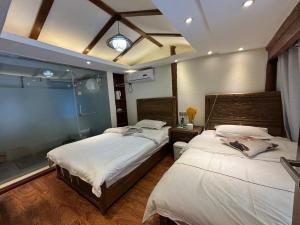 Fotografie z fotogalerie ubytování 云中君客栈 Sunshine guest house v destinaci Li-ťiang
