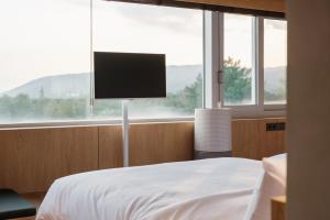 Letto o letti in una camera di Kinock