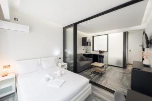 Posteľ alebo postele v izbe v ubytovaní Athenian Dream Suite
