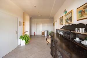 Kuchyň nebo kuchyňský kout v ubytování Hotel Volf