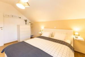 Postel nebo postele na pokoji v ubytování Apartmaji Klavdija