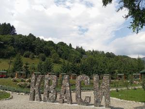 a sign that says garden in a park at Girska Tysa Health Resort in Kvasy