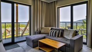Khu vực ghế ngồi tại Orlik VIP Residence by Royal Aparts - apartamenty z widokiem na Śnieżkę, blisko wyciągu i Wang