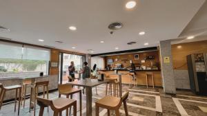 Kuchyň nebo kuchyňský kout v ubytování Hotel-Apartamentos Tartesos