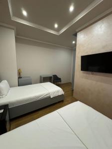 Voodi või voodid majutusasutuse Hotel Vila Zeus toas