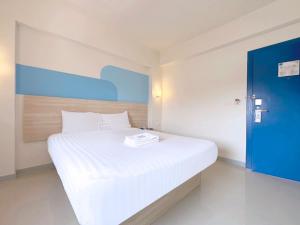 Postel nebo postele na pokoji v ubytování HOP INN Krabi Building A