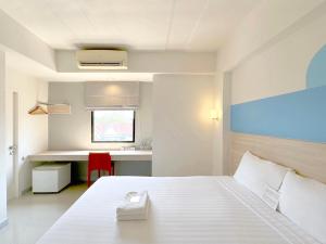 Postel nebo postele na pokoji v ubytování HOP INN Krabi Building A