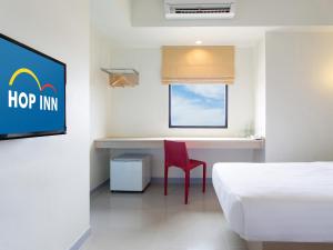 Postel nebo postele na pokoji v ubytování HOP INN Krabi Building A