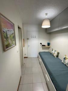 Postel nebo postele na pokoji v ubytování Charmant appartement cosy, terrasse proche des pistes et du centre du village - WIFI gratuit