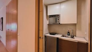 Kuchyň nebo kuchyňský kout v ubytování Hotel-Apartamentos Tartesos + 11 fotografií