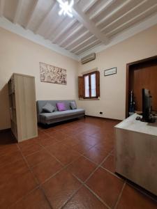 Postel nebo postele na pokoji v ubytování L'antica dimora Torre di Cascina