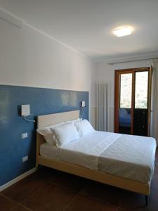 Postel nebo postele na pokoji v ubytování Casa Cicone