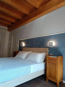 Postel nebo postele na pokoji v ubytování Casa Cicone