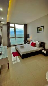 Ένα ή περισσότερα κρεβάτια σε δωμάτιο στο SKY Villas - Oasky Tower Vũng Tàu, Pool and Gym, BeachFront