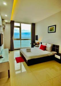 Ένα ή περισσότερα κρεβάτια σε δωμάτιο στο SKY Villas - Oasky Tower Vũng Tàu, Pool and Gym, BeachFront