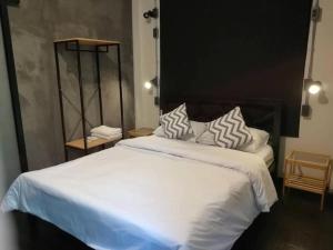 Dreamcatcher Bangkok客房内的一张或多张床位