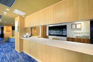 Televiisor ja/või meelelahutuskeskus majutusasutuses Ocean View Hiromi SPA Hotel温泉と絶景の宿