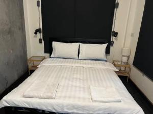 Dreamcatcher Bangkok客房内的一张或多张床位