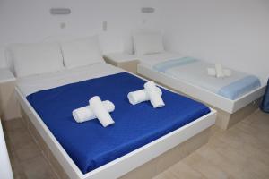 Ένα ή περισσότερα κρεβάτια σε δωμάτιο στο The Three Anchors Rooms +37 φωτογραφίες