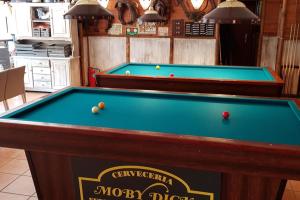 a pool table with balls on top of it at MobyDick 9B in Benidorm