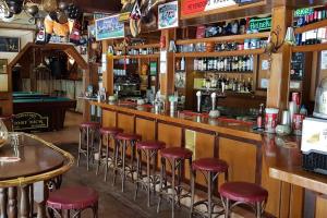 a bar with red stools in a restaurant at MobyDick 9B in Benidorm