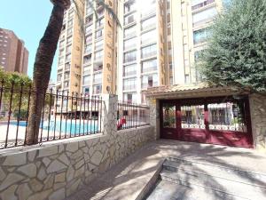 a building with a gate in front of a building at MobyDick 9B in Benidorm