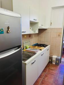 Kuchyň nebo kuchyňský kout v ubytování Oikos + 23 fotografií