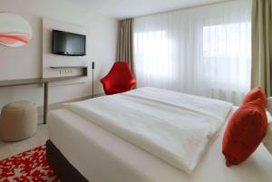 Letto o letti in una camera di Ramada by Wyndham Dresden