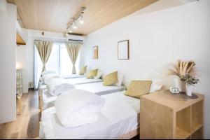 大阪市にあるルミエール天満の白いベッドが並ぶ部屋 +30枚の写真