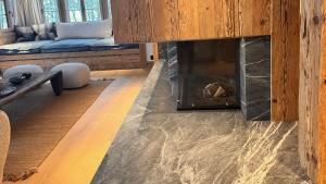 Ruang duduk di Chalet by the River in Gstaad With Sauna