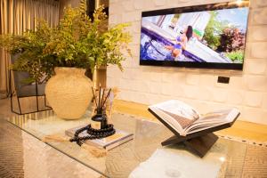 TV o dispositivi per l'intrattenimento presso Vanity Villa Luxe Residence Ikoyi