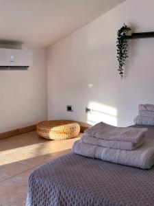 Postel nebo postele na pokoji v ubytování Casa Polgabe - Quadrilocale con vista - Assisi
