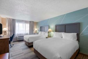 Letto o letti in una camera di Comfort Inn & Suites Boulder