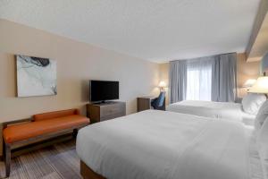 Letto o letti in una camera di Comfort Inn & Suites Boulder