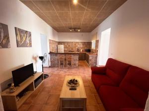 TV a/nebo společenská místnost v ubytování BAMBÚ · Casa rural en Vejer con piscina privada